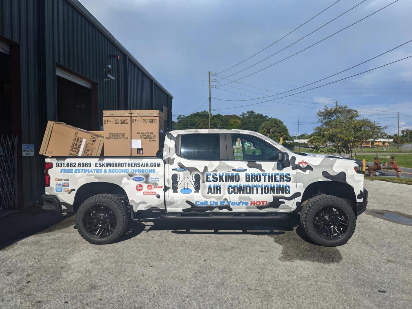 Eskimo Brothers camo truck with units in the bed — 931-682-6969