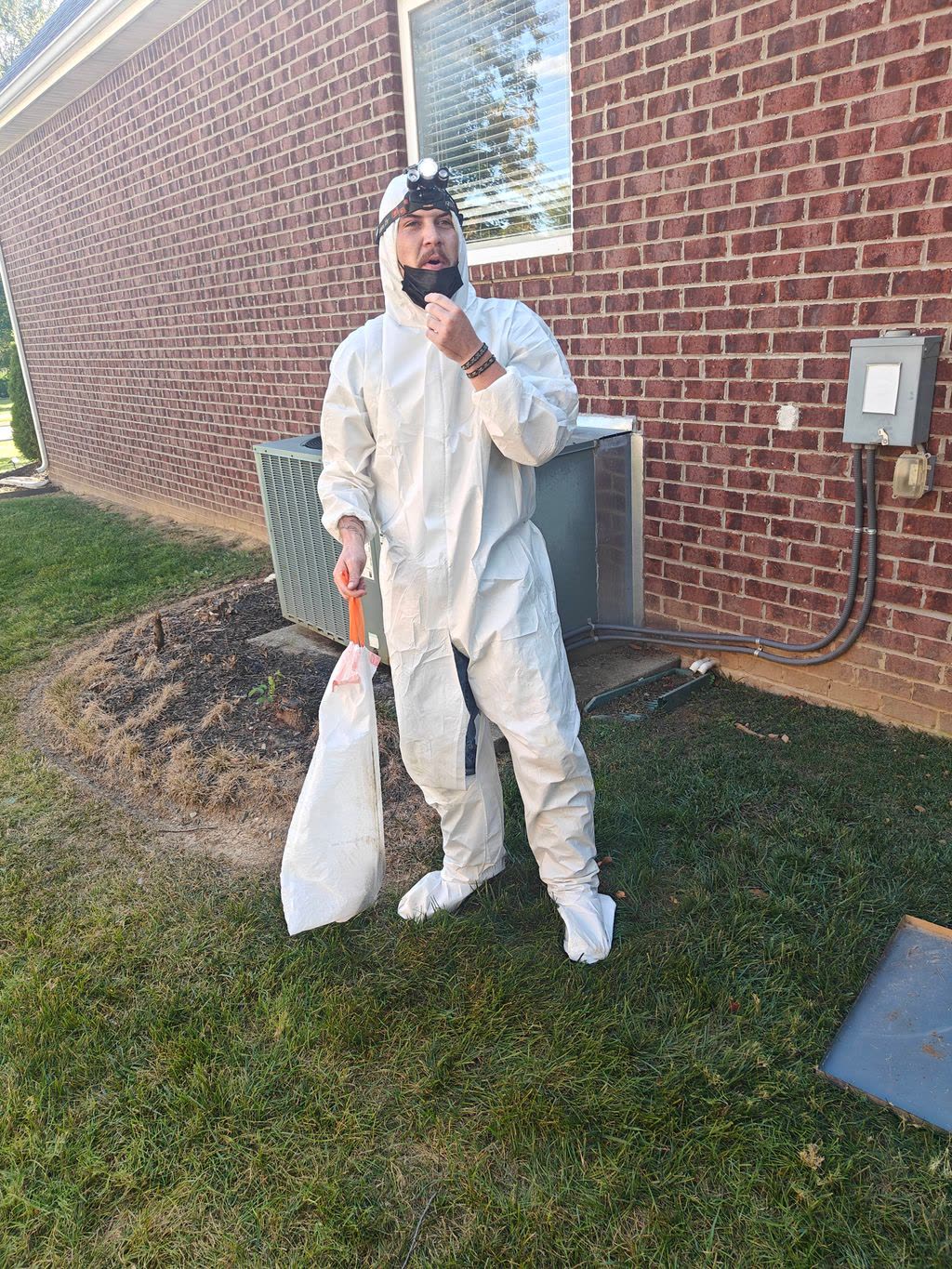 Technician in Tyvek
